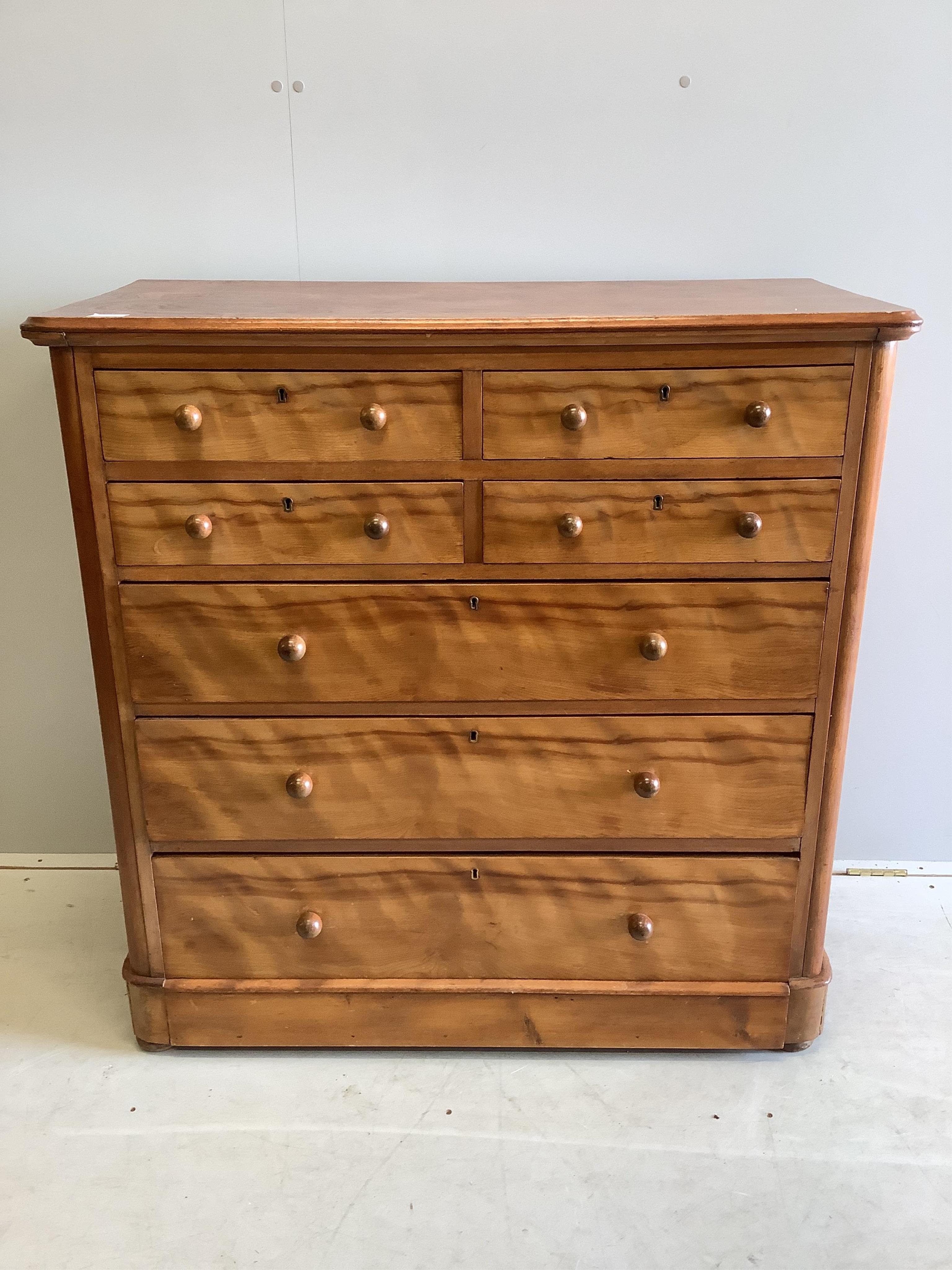 A Victorian satin birch chest of drawers, stamped Moore and Hunton, London, width 104cm, depth 51cm, height 105cm. Condition - poor to fair
